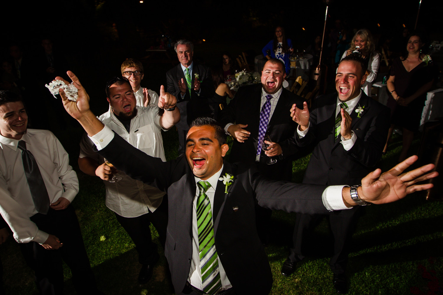 Groomsmen dancing at the reception