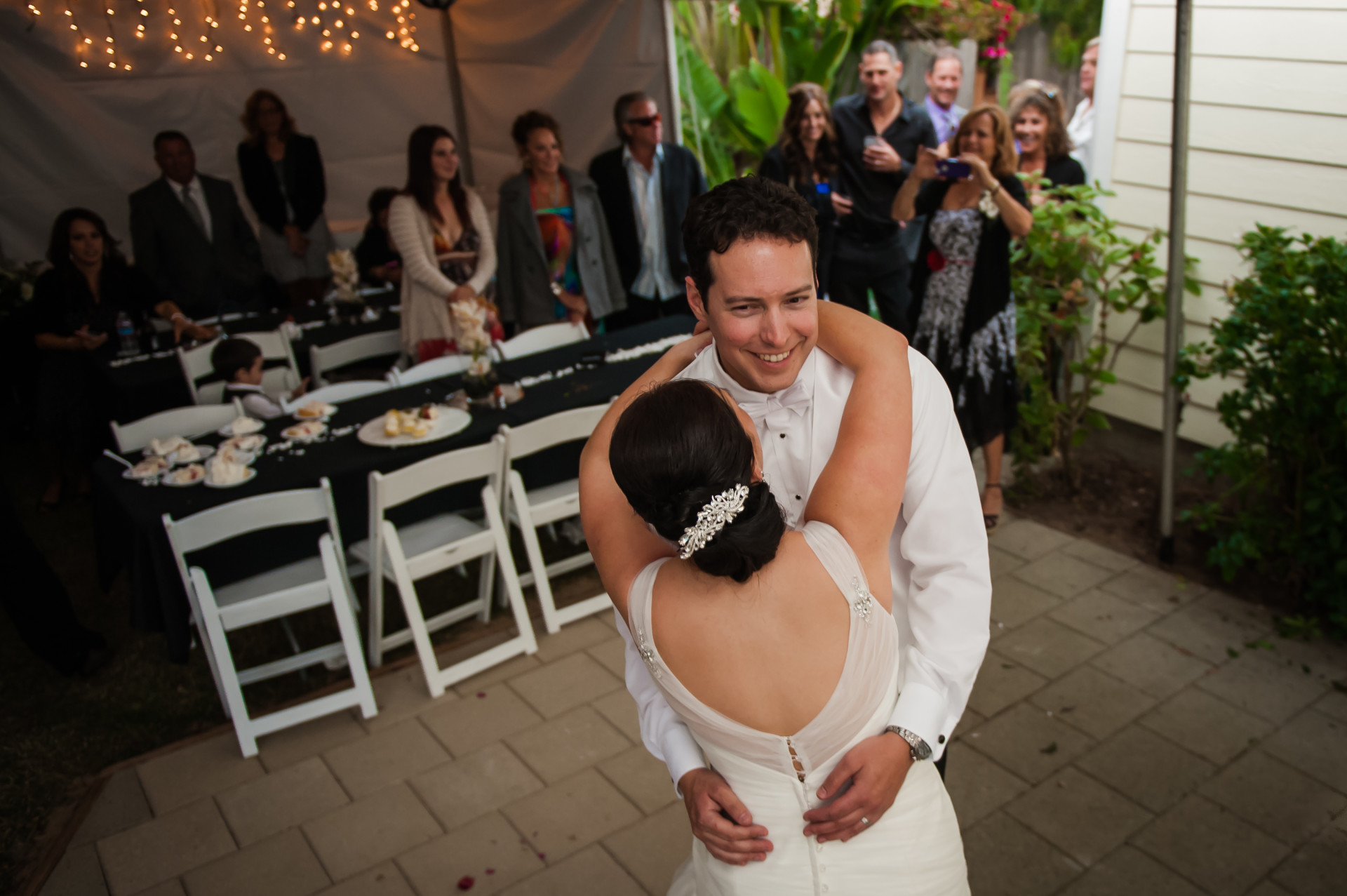 Bride and groom dance in Morro Bay